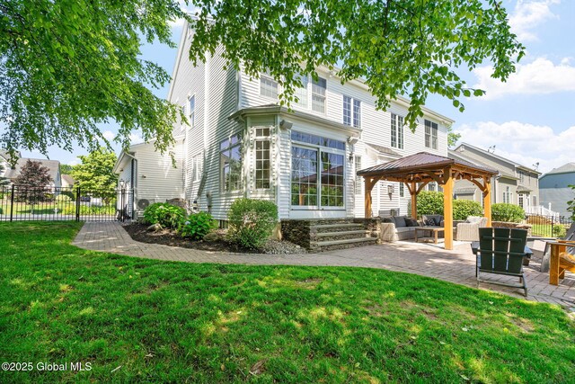 11 Fairview Ln, Halfmoon, NY 12118 - back of property with a gazebo, outdoor lounge area, and a patio area