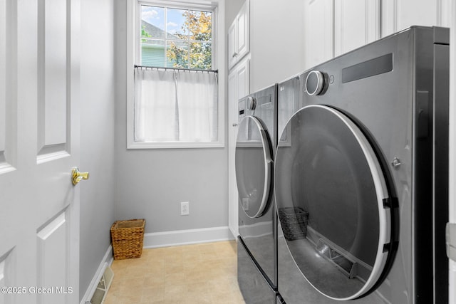 11 Fairview Ln, Halfmoon, NY 12118 - washroom featuring cabinet space and washer and dryer