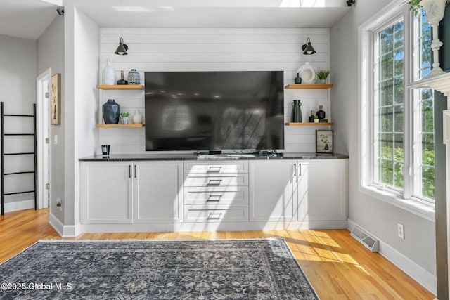 11 Fairview Ln, Halfmoon, NY 12118 - unfurnished living room with light wood-type flooring