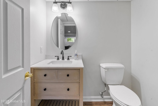11 Fairview Ln, Halfmoon, NY 12118 - bathroom featuring vanity and wood finished floors