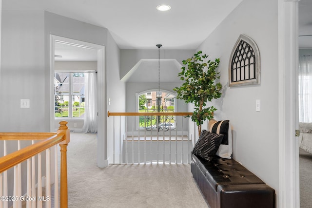 11 Fairview Ln, Halfmoon, NY 12118 - hall with carpet flooring, a chandelier, an upstairs landing, and recessed lighting