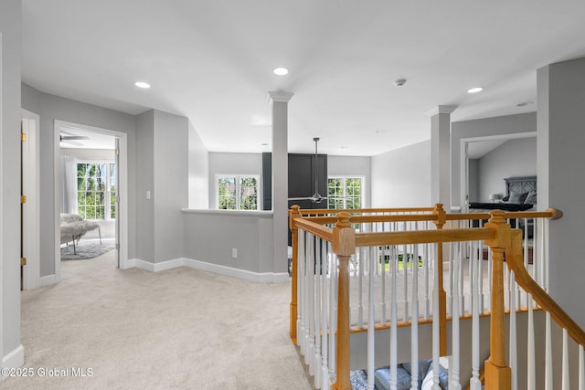 11 Fairview Ln, Halfmoon, NY 12118 - corridor featuring light colored carpet, plenty of natural light, recessed lighting, and an upstairs landing