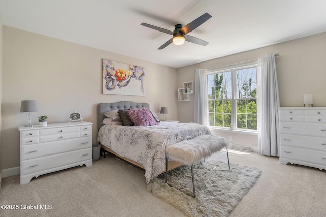 11 Fairview Ln, Halfmoon, NY 12118 - bedroom with light carpet and ceiling fan