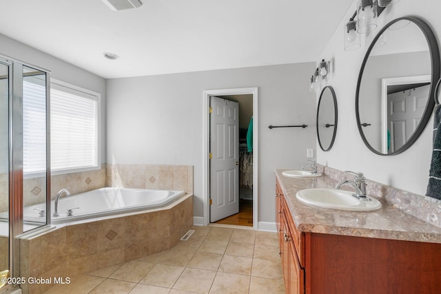 11 Fairview Ln, Halfmoon, NY 12118 - full bathroom with tile patterned floors, double vanity, and a bath