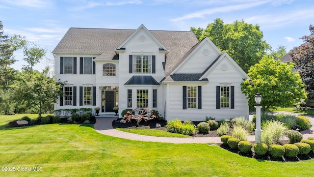 11 Fairview Ln, Halfmoon, NY 12118 - view of front of home with a front yard and a shingled roof