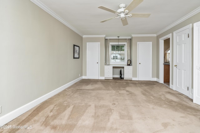 101 Euclid Ave, Albany, NY 12203 - unfurnished living room with built in study area, ornamental molding, a ceiling fan, and light colored carpet