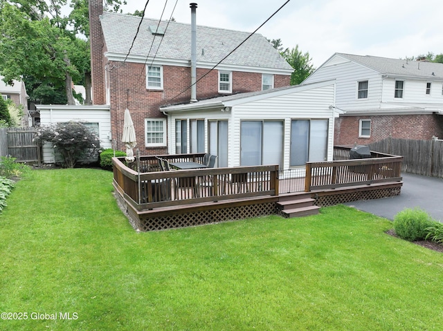 101 Euclid Ave, Albany, NY 12203 - back of house with a wooden deck, brick siding, and a chimney
