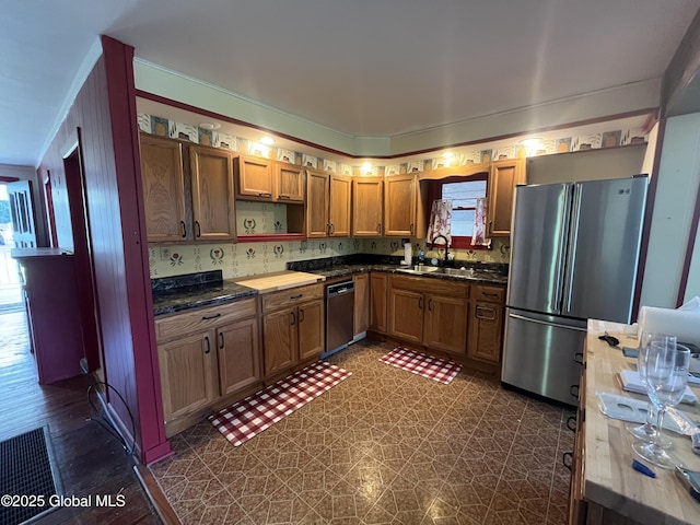 65 W Broadway, Salem, NY 12865 - kitchen with stainless steel appliances, open shelves, dark countertops, dark floors, and brown cabinetry