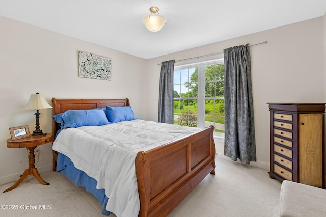 7 Anthony Ln, Saratoga Springs, NY 12866 - bedroom with light carpet and baseboards