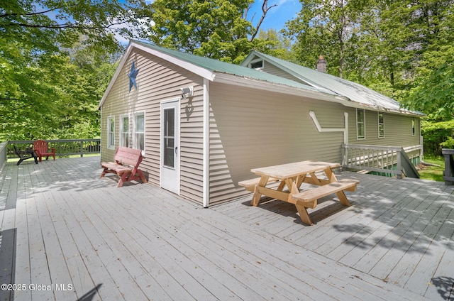 633 Moore Hill Rd, Stephentown, NY 12168 - wooden terrace featuring outdoor dining area and view of wooded area