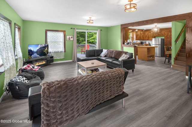 633 Moore Hill Rd, Stephentown, NY 12168 - living room featuring wood finished floors and stairway