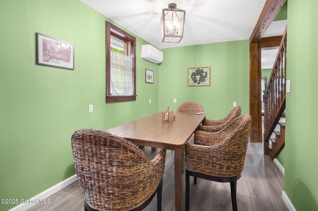 633 Moore Hill Rd, Stephentown, NY 12168 - dining room featuring a wall mounted AC, stairway, and wood finished floors