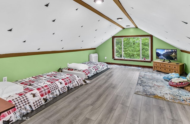 633 Moore Hill Rd, Stephentown, NY 12168 - bedroom featuring wood finished floors and vaulted ceiling