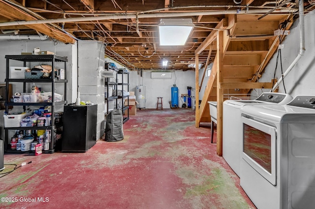 633 Moore Hill Rd, Stephentown, NY 12168 - unfinished below grade area with washing machine and dryer and electric water heater