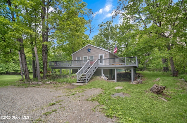 633 Moore Hill Rd, Stephentown, NY 12168 - view of front of home featuring a wooden deck, stairs, and a front lawn
