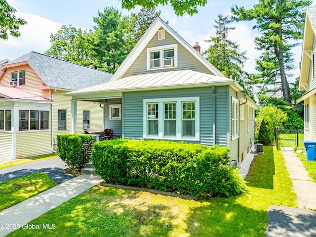 87 Hollywood Ave, Albany, NY 12208 - bungalow featuring a standing seam roof, a chimney, and a metal roof
