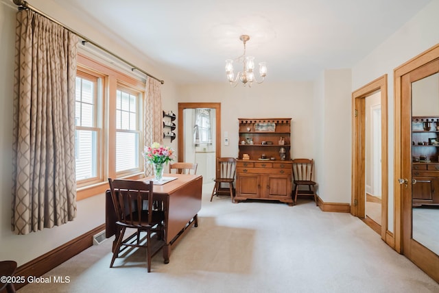 87 Hollywood Ave, Albany, NY 12208 - dining space featuring a chandelier and light carpet