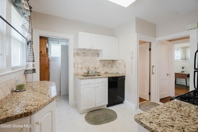 87 Hollywood Ave, Albany, NY 12208 - kitchen with dishwasher, white cabinets, tasteful backsplash, and light stone countertops