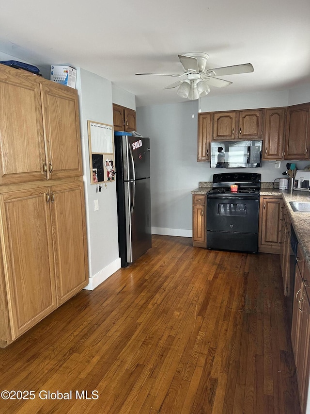 246 Fourteenth St, Schenectady, NY 12306 - kitchen with black appliances, dark wood finished floors, and ceiling fan