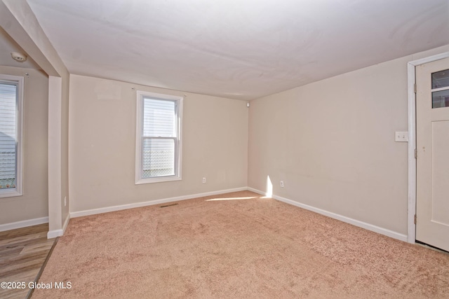 901 Adams St, Rotterdam, NY 12306 - carpeted spare room featuring baseboards and a smoke detector
