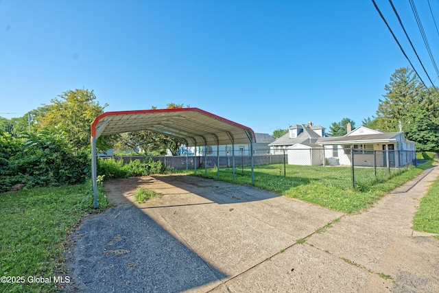 901 Adams St, Rotterdam, NY 12306 - view of yard featuring concrete driveway and a detached carport