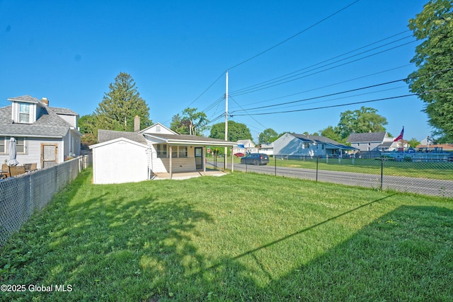 901 Adams St, Rotterdam, NY 12306 - fenced backyard with a patio area