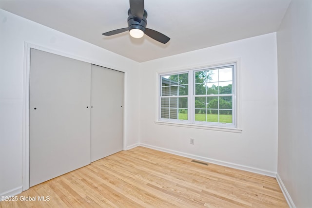21 Crooked St, Charlton, NY 12019 - unfurnished bedroom featuring light wood-type flooring, a closet, and a ceiling fan