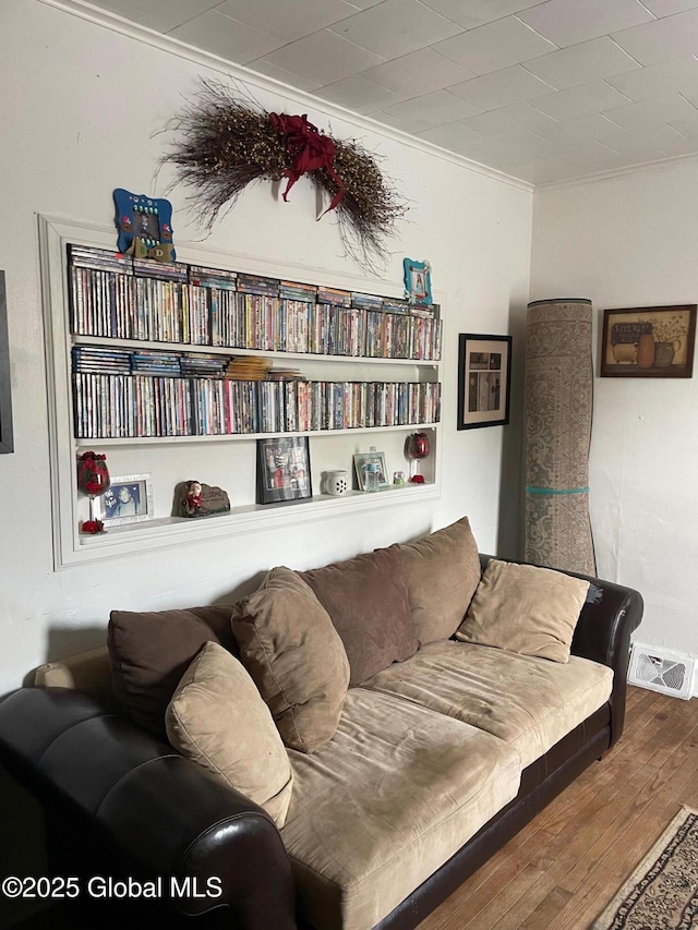 21-25 Mohawk St, Fort Plain, NY 13339 - living area with crown molding and hardwood / wood-style flooring