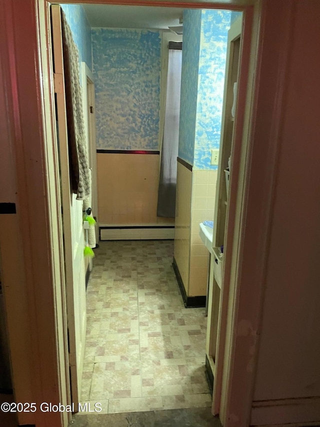 21-25 Mohawk St, Fort Plain, NY 13339 - bathroom with a baseboard radiator, wallpapered walls, and a wainscoted wall