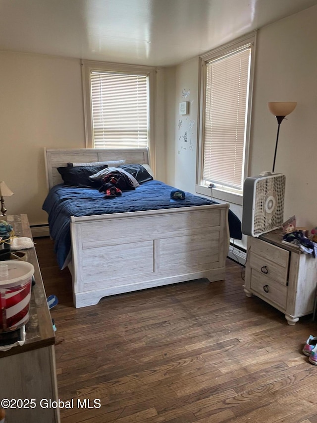21-25 Mohawk St, Fort Plain, NY 13339 - bedroom with dark wood-style flooring and a baseboard radiator