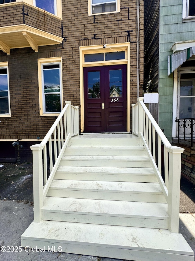 358 2nd St, Albany, NY 12206 - doorway to property with brick siding and french doors