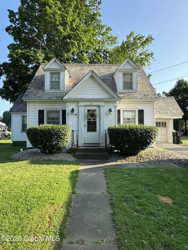 23 Ferry Blvd, South Glens Falls, NY 12803 - view of front of property with a front lawn and an attached garage