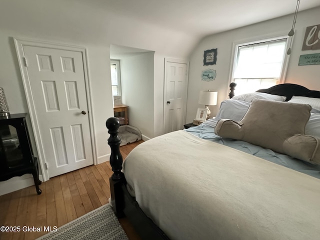 23 Ferry Blvd, South Glens Falls, NY 12803 - bedroom with wood-type flooring and vaulted ceiling