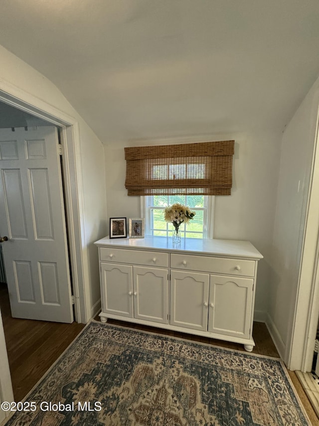 23 Ferry Blvd, South Glens Falls, NY 12803 - kitchen featuring dark wood-style floors, white cabinets, vaulted ceiling, and light countertops