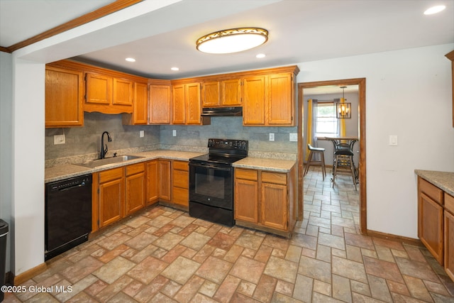 3445 Gari Ln, Guilderland, NY 12303 - kitchen featuring black appliances, under cabinet range hood, tasteful backsplash, brown cabinets, and recessed lighting