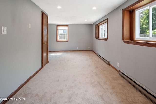 3445 Gari Ln, Guilderland, NY 12303 - unfurnished room with a baseboard heating unit, light colored carpet, and recessed lighting