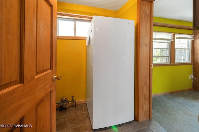 3445 Gari Ln, Guilderland, NY 12303 - kitchen featuring brown cabinets and dark tile patterned flooring