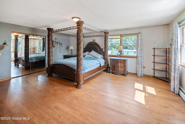 3445 Gari Ln, Guilderland, NY 12303 - bedroom with access to outside and light wood finished floors