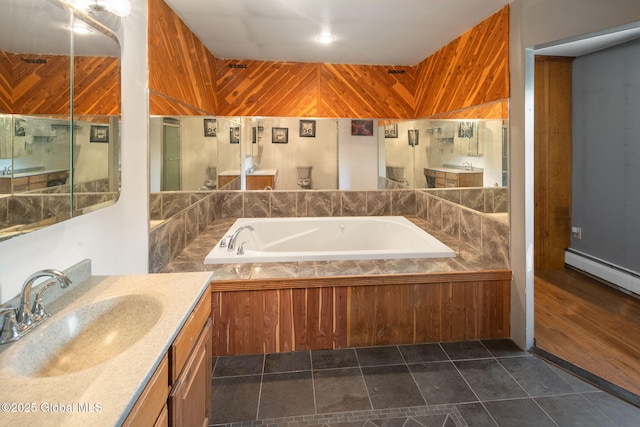 3445 Gari Ln, Guilderland, NY 12303 - bathroom featuring a bath, vanity, and baseboard heating