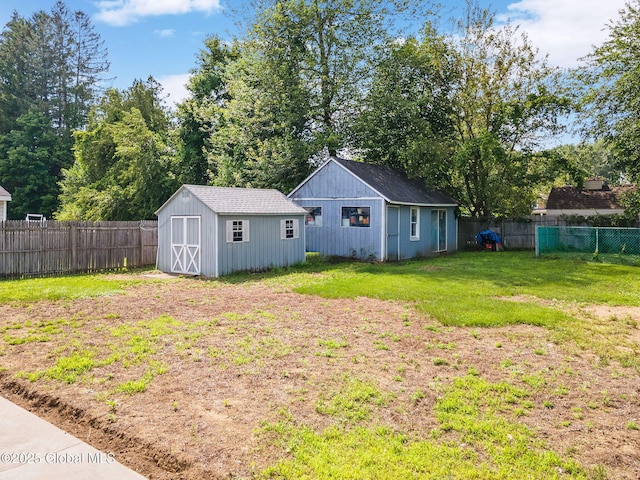 3445 Gari Ln, Guilderland, NY 12303 - fenced backyard featuring an outdoor structure