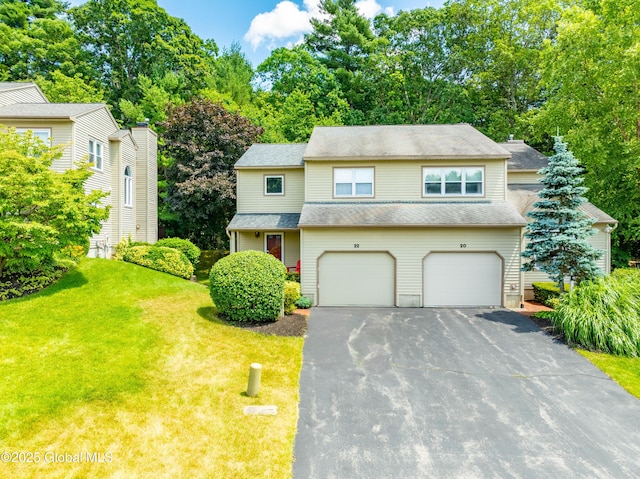 22 Pine Ridge Rd, Stillwater, NY 12866 - view of front of house featuring driveway, a garage, a front yard, and a shingled roof