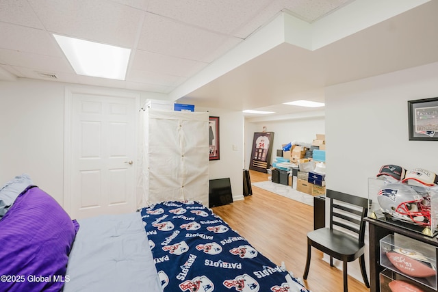 22 Pine Ridge Rd, Stillwater, NY 12866 - bedroom featuring wood finished floors and a paneled ceiling