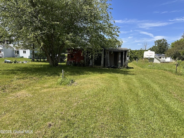 634 State Route 143, Westerlo, NY 12193 - view of green lawn with an outdoor structure