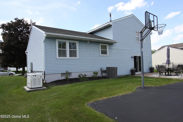 6 Galileo Way, Colonie, NY 12110 - back of house with a yard, roof with shingles, and a patio area