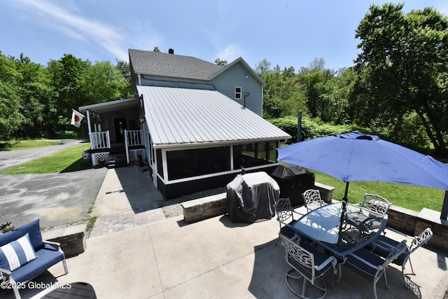 157 Mosquito Swamp Rd, Greenwich, NY 12834 - view of patio featuring outdoor dining space, area for grilling, and a sunroom