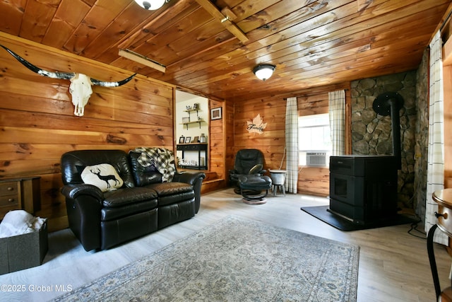 157 Mosquito Swamp Rd, Greenwich, NY 12834 - living room with wood ceiling, a wood stove, wood finished floors, and wooden walls