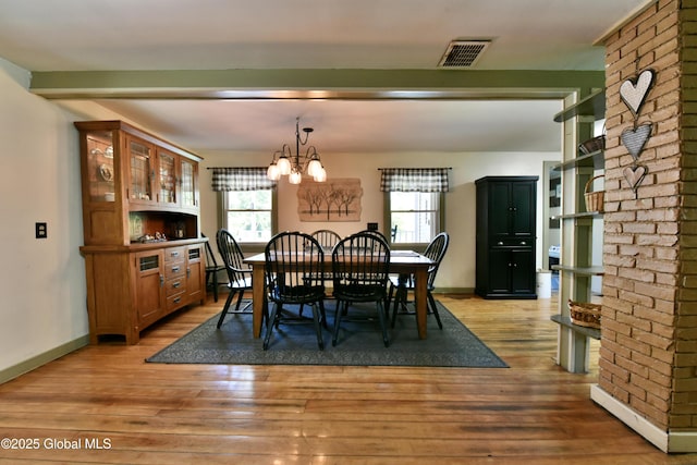 157 Mosquito Swamp Rd, Greenwich, NY 12834 - dining area featuring light wood-style flooring and a chandelier