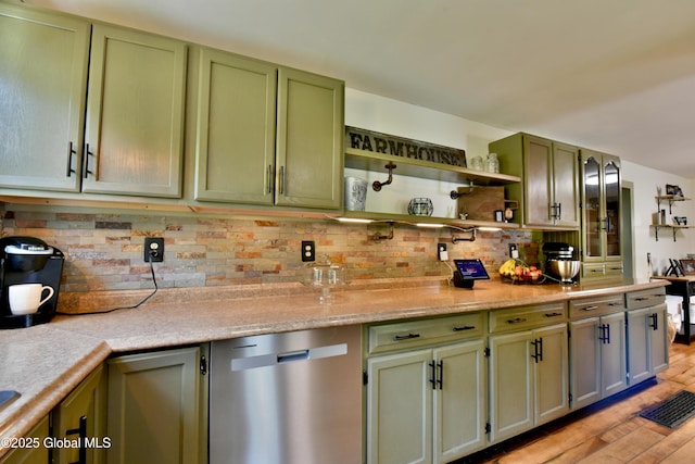 157 Mosquito Swamp Rd, Greenwich, NY 12834 - kitchen featuring stainless steel dishwasher, green cabinetry, light wood-style floors, and light countertops