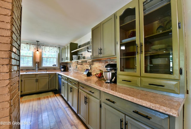 157 Mosquito Swamp Rd, Greenwich, NY 12834 - kitchen with open shelves, green cabinets, light countertops, decorative backsplash, and light wood finished floors