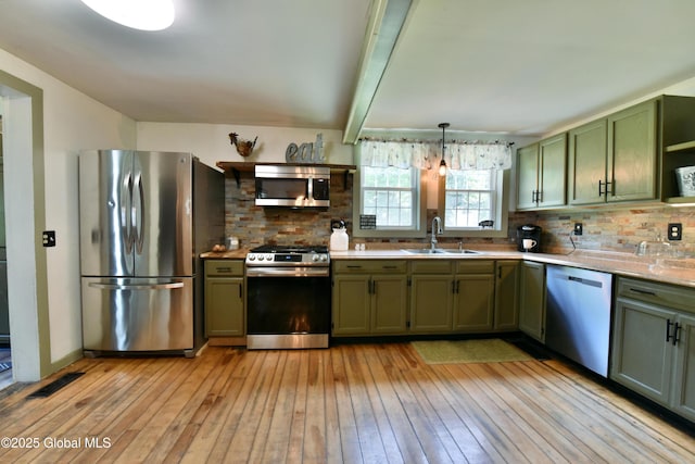 157 Mosquito Swamp Rd, Greenwich, NY 12834 - kitchen featuring appliances with stainless steel finishes, green cabinetry, light wood-style flooring, open shelves, and beam ceiling